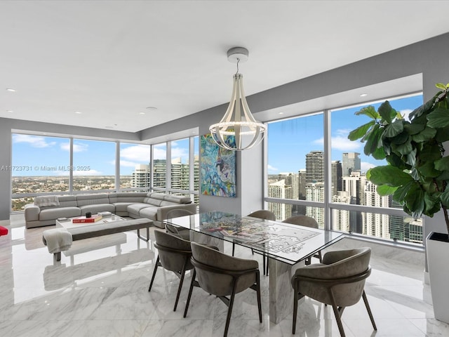 dining room featuring an inviting chandelier and a wealth of natural light