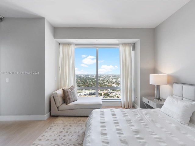 bedroom featuring light wood-type flooring