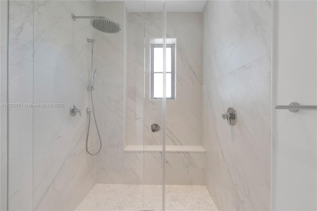 bathroom featuring an enclosed shower