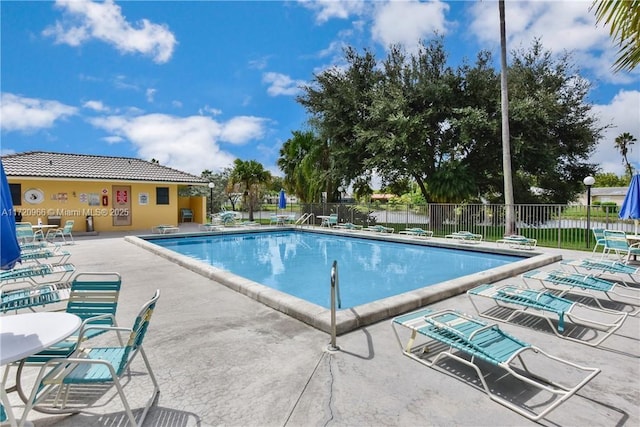 view of pool featuring a patio