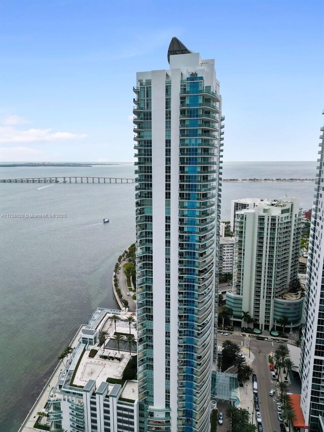 view of building exterior with a water view