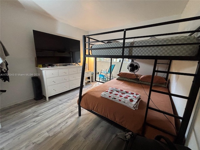 bedroom featuring light hardwood / wood-style floors