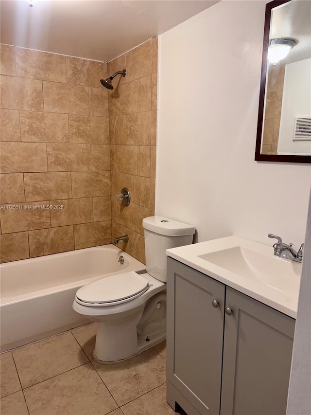 full bath featuring vanity, tile patterned floors, toilet, visible vents, and tub / shower combination