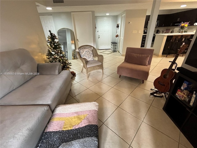 living room with light tile patterned floors