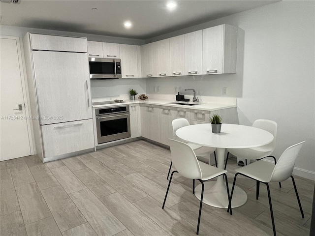 kitchen with sink and stainless steel appliances