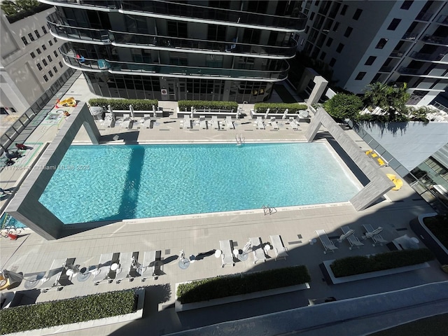 view of pool featuring a patio area