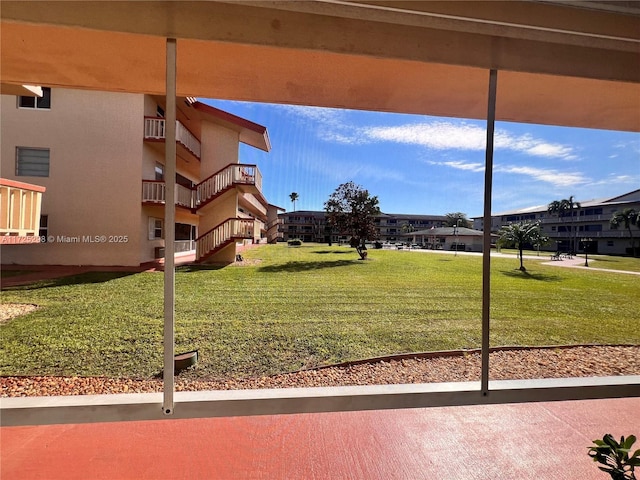 view of community with a lawn