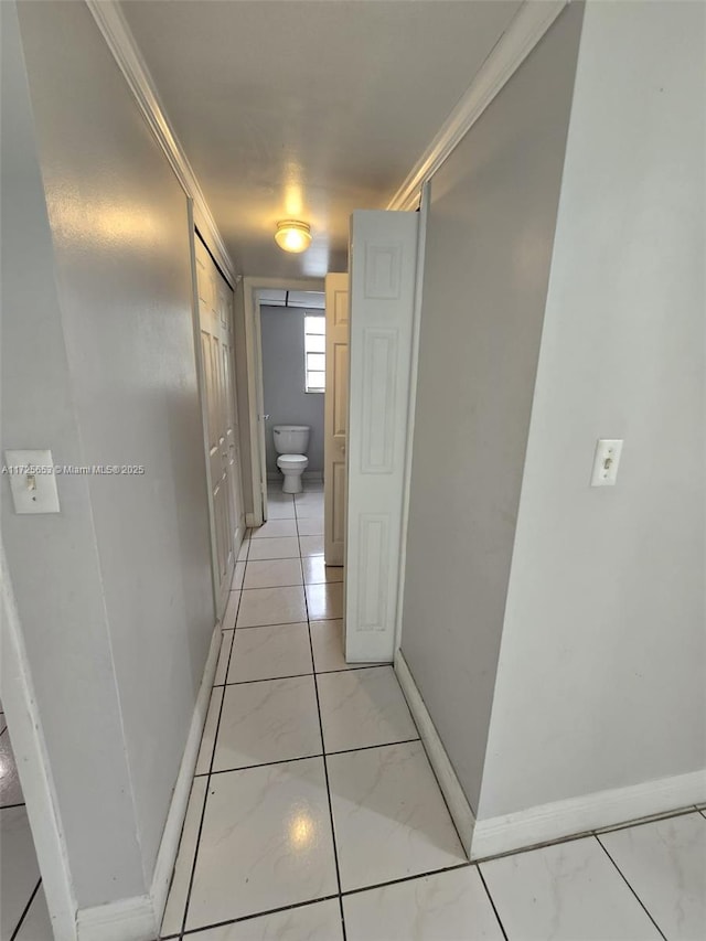 hallway with crown molding