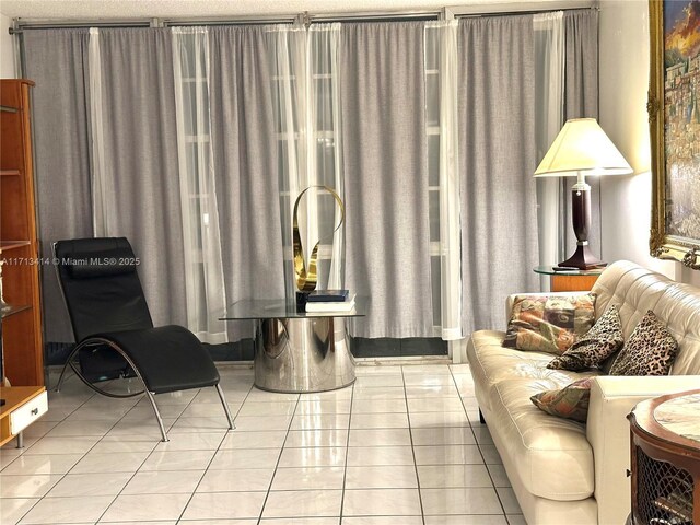 living area featuring light tile patterned flooring