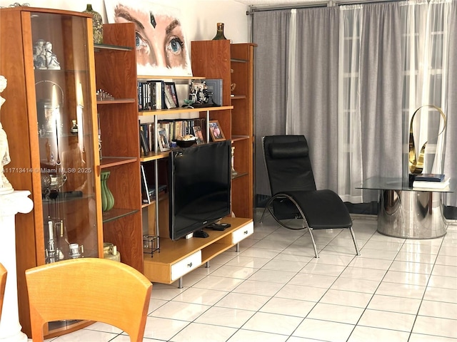 living area with light tile patterned floors