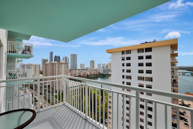 balcony featuring a water view