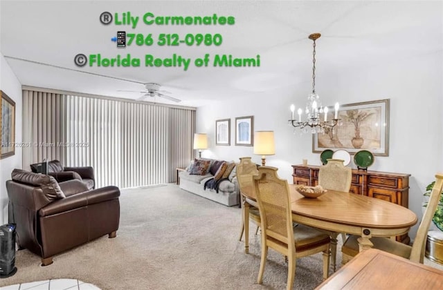 dining space featuring light colored carpet and ceiling fan with notable chandelier