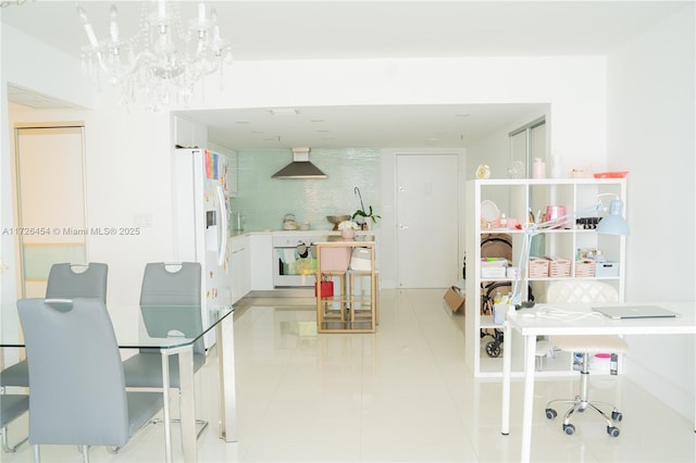 interior space with an inviting chandelier and light tile patterned flooring