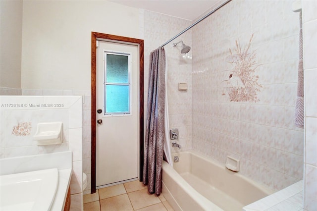 bathroom featuring tile patterned flooring and shower / bathtub combination with curtain