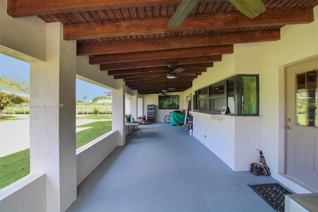 view of patio featuring ceiling fan