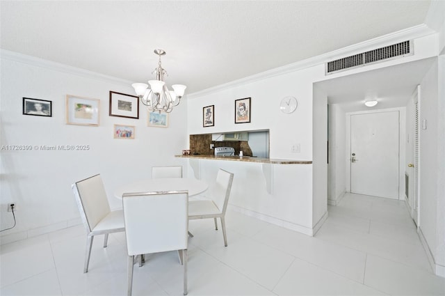 dining space featuring an inviting chandelier, light tile patterned flooring, and ornamental molding