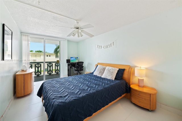 tiled bedroom with access to outside, a textured ceiling, and ceiling fan