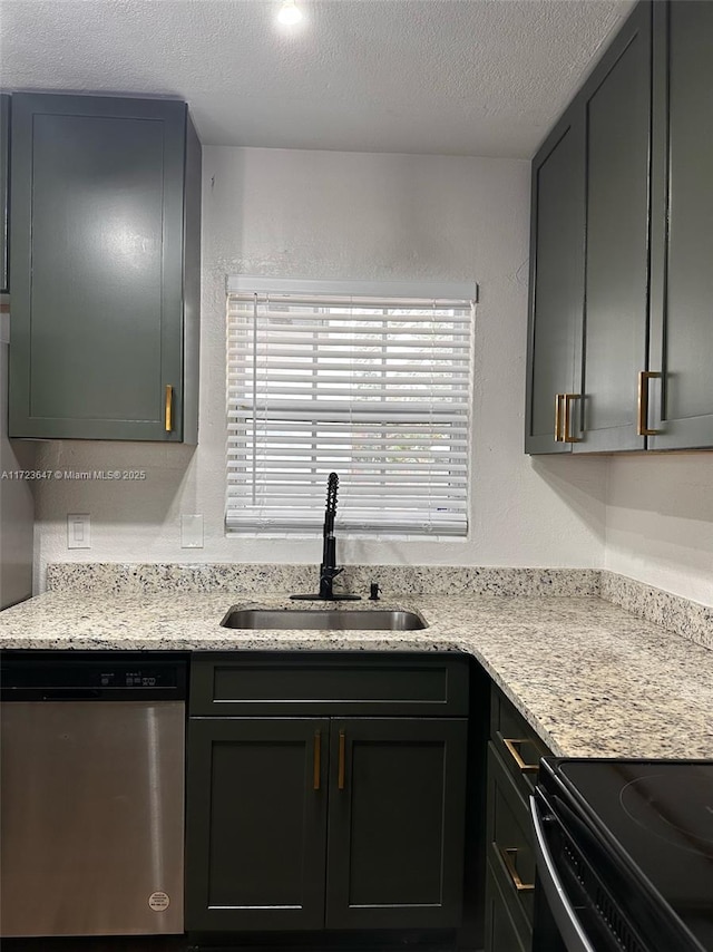 kitchen with light stone countertops, a textured ceiling, dishwasher, and sink