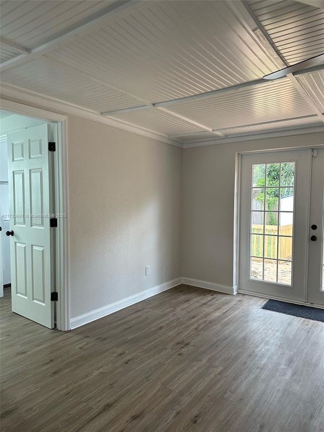 unfurnished room with french doors and dark hardwood / wood-style flooring