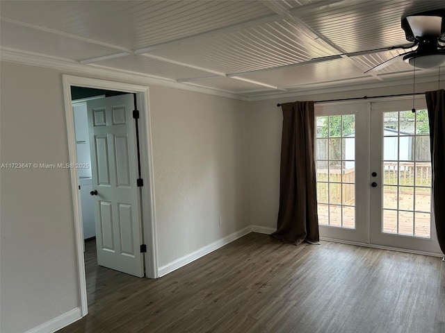 empty room with ceiling fan, french doors, and dark hardwood / wood-style flooring