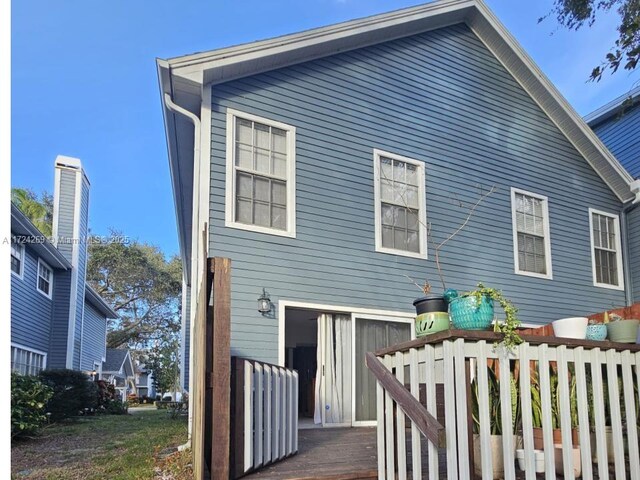 rear view of house with a deck