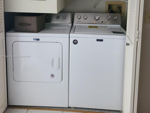 laundry area featuring washing machine and dryer