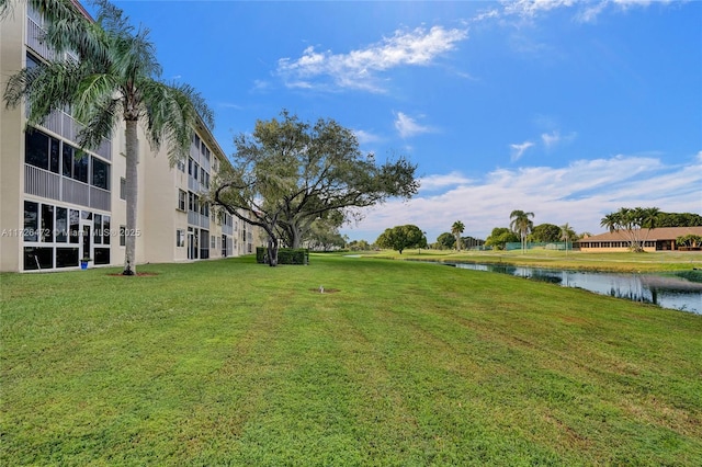 view of yard with a water view