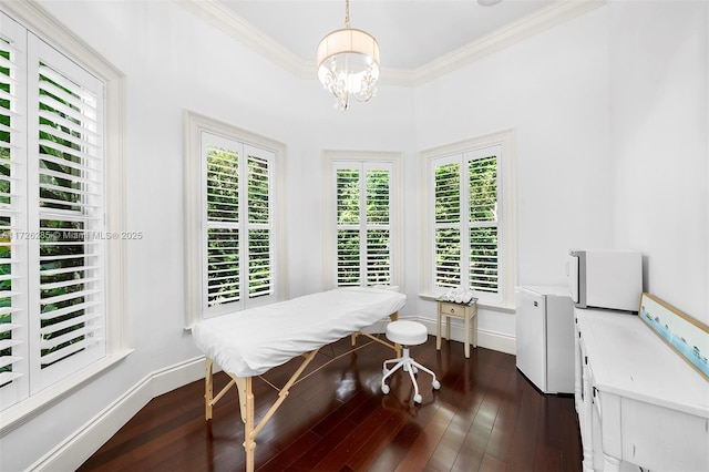 office with dark wood-type flooring, plenty of natural light, crown molding, and a chandelier