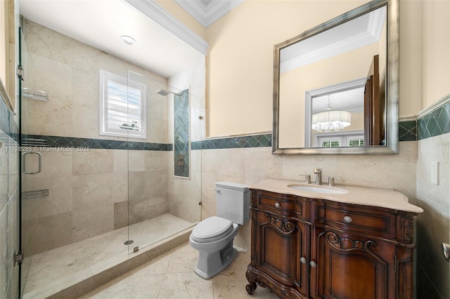 bathroom with toilet, crown molding, tile walls, and walk in shower