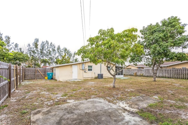 view of yard with central AC