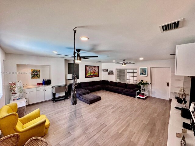 bar featuring dark hardwood / wood-style flooring