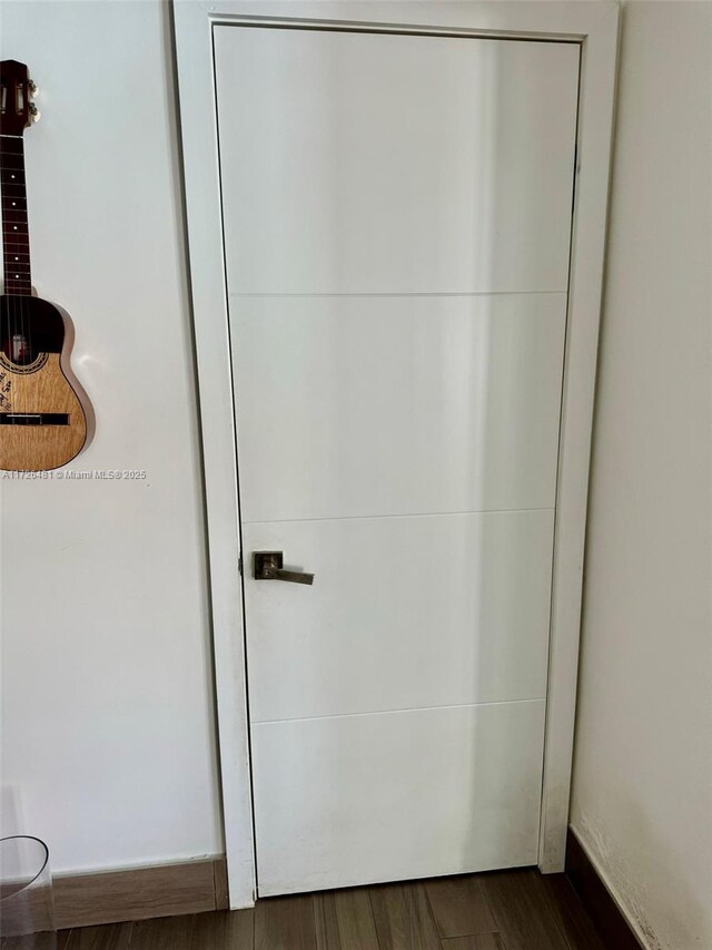 corridor featuring tile patterned flooring