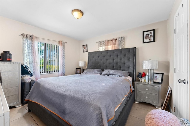 bedroom featuring light tile patterned floors