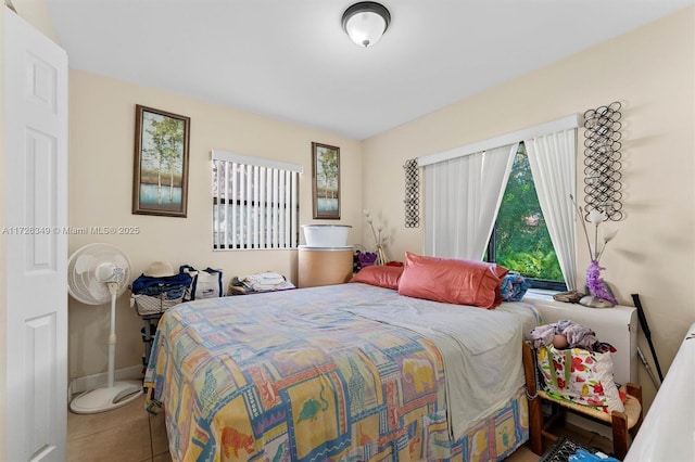 bedroom featuring tile patterned floors