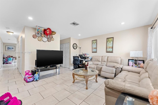 living room featuring light tile patterned floors