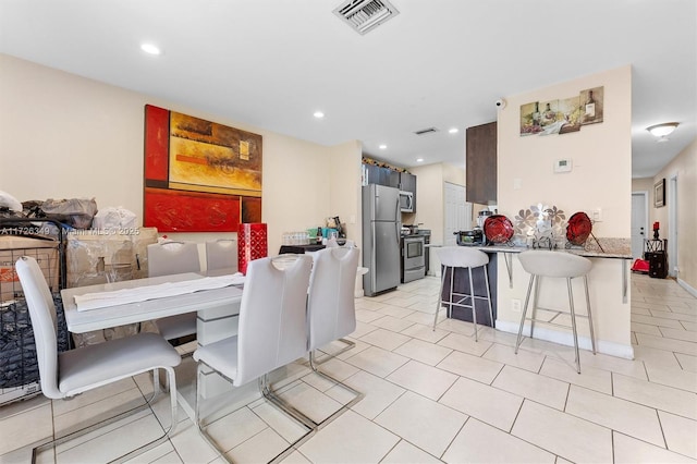 view of tiled dining space