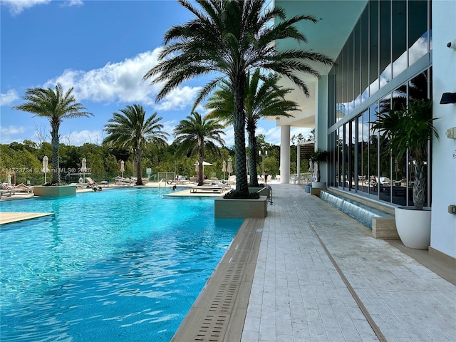 view of swimming pool with a patio area