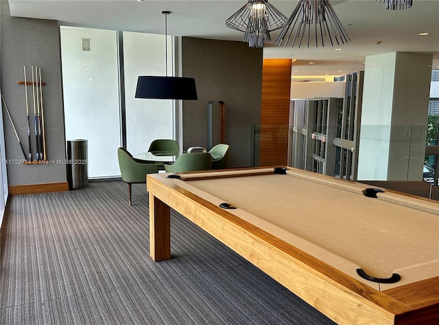 recreation room featuring carpet, pool table, and a wall of windows