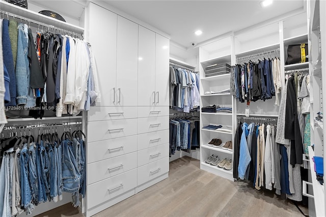 spacious closet featuring light wood-type flooring