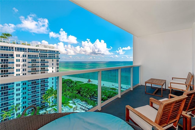 balcony featuring a water view