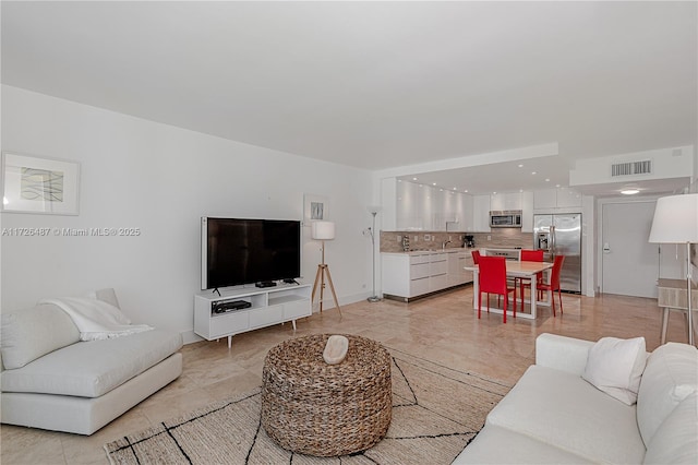 living room with sink