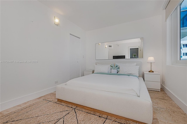 2301 Collins Ave Unit 1515, Miami Beach, FL 33139 - bedroom with baseboards