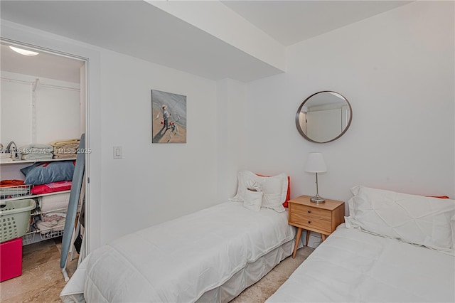 2301 Collins Ave Unit 1515, Miami Beach, FL 33139 - bedroom with a walk in closet and a closet