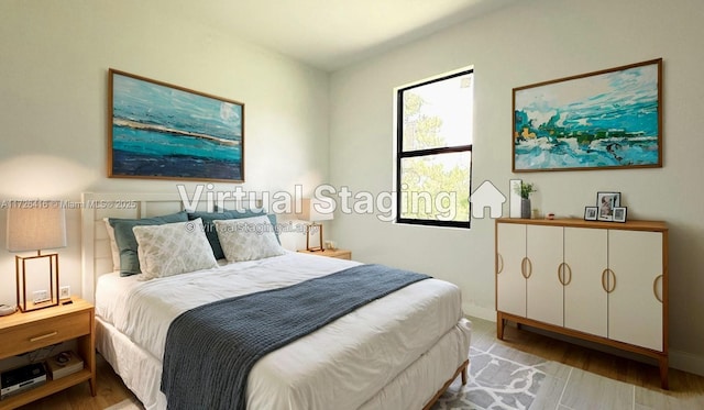 bedroom featuring light hardwood / wood-style floors