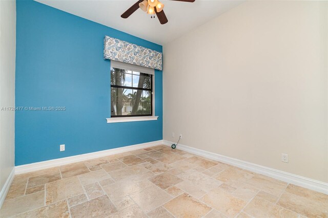 unfurnished room featuring ceiling fan