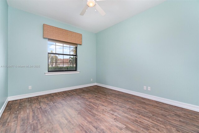 unfurnished room featuring ceiling fan and hardwood / wood-style floors