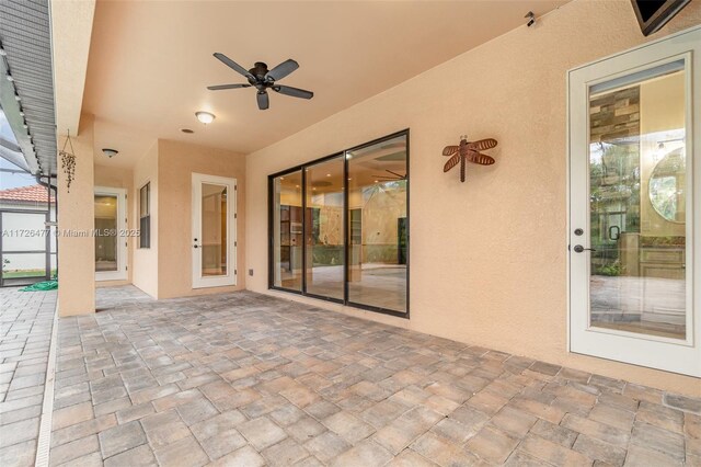 view of patio with ceiling fan