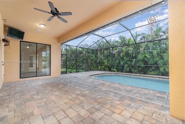 view of pool featuring a lanai and a patio