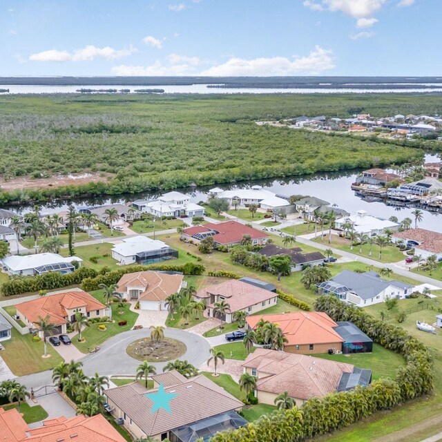 drone / aerial view with a water view