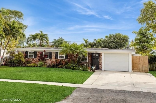 single story home with a garage and a front yard